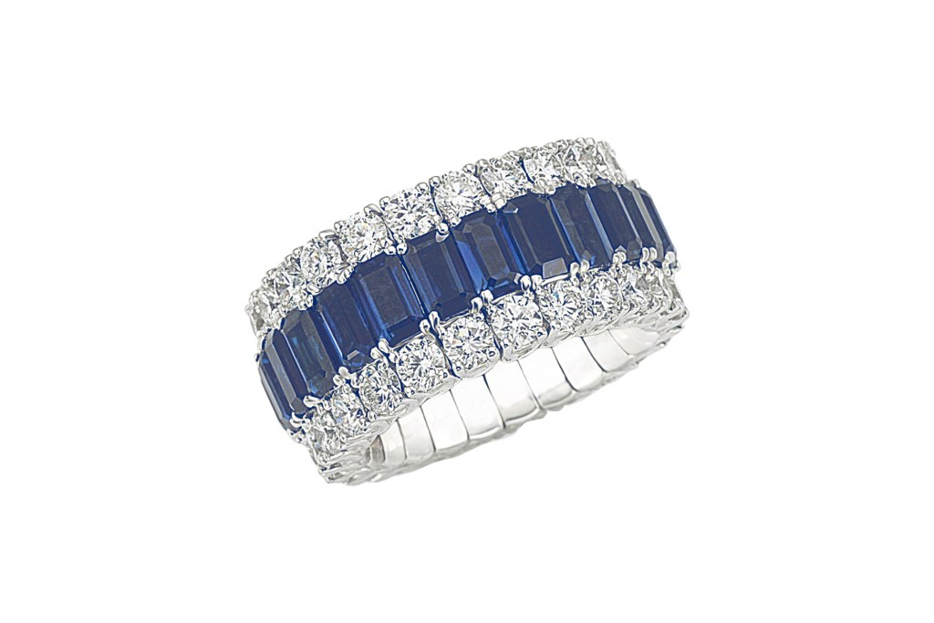 Close up of a Picchiotti 18-k white-gold flex ring with diamonds and sapphires.