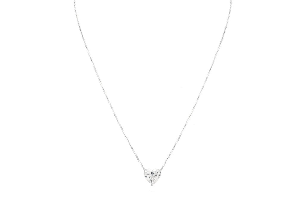 Close up of a London Collection 18-k white-gold necklace with heart-shaped diamond.