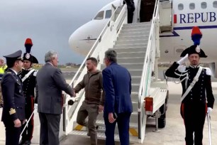 Ukrainian President Volodymyr Zelensky is welcomed by Italy's Foreign Minister Antonio Tajani as he arrives at Rome's Ciampino airport, Italy on May 13, 2023.