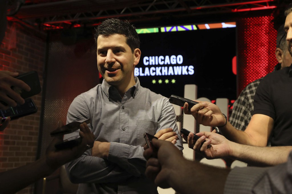 Blackhawks GM Kyle Davidson takes questions after an event for reporters and potential season ticket holders at the United Center Concert Club on May 16, 2022.