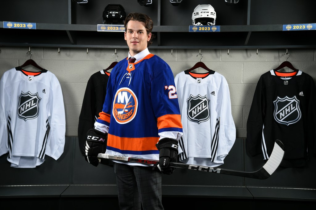 Justin Gill poses for a portrait after being selected 145th overall by the New York Islanders.