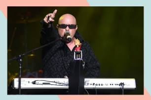 A Flock Of Seagulls vocalist and keyboardist Mike Score sings and plays at the same time.