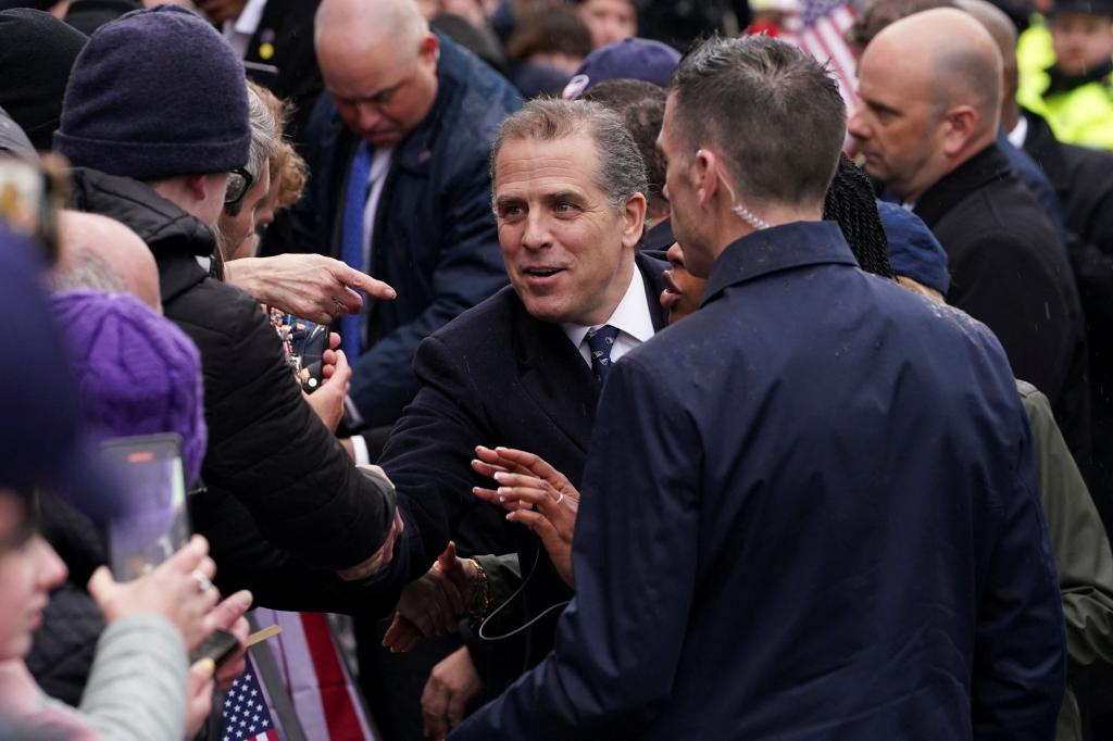 Hunter Biden greets supporters of his father.