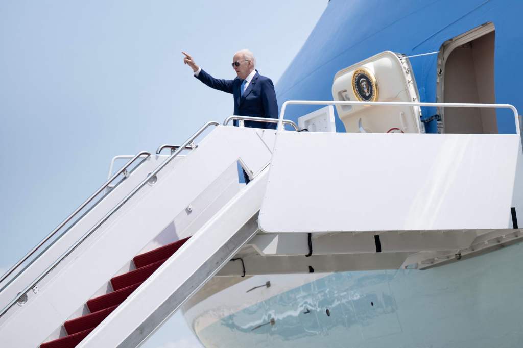Joe Biden exiting plane