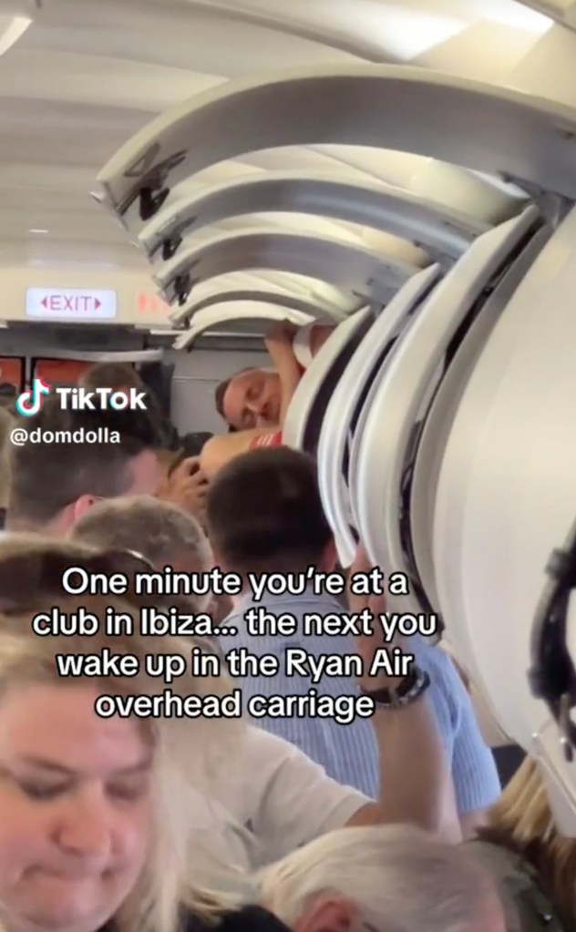 "One minute you're at the club in Ibiza, the next you wake up in the Ryanair overhead carriage," reads the in-video caption. "40 dudes at the back of the plane were having a TIME. They pushed their mate in there as the plane landed" 