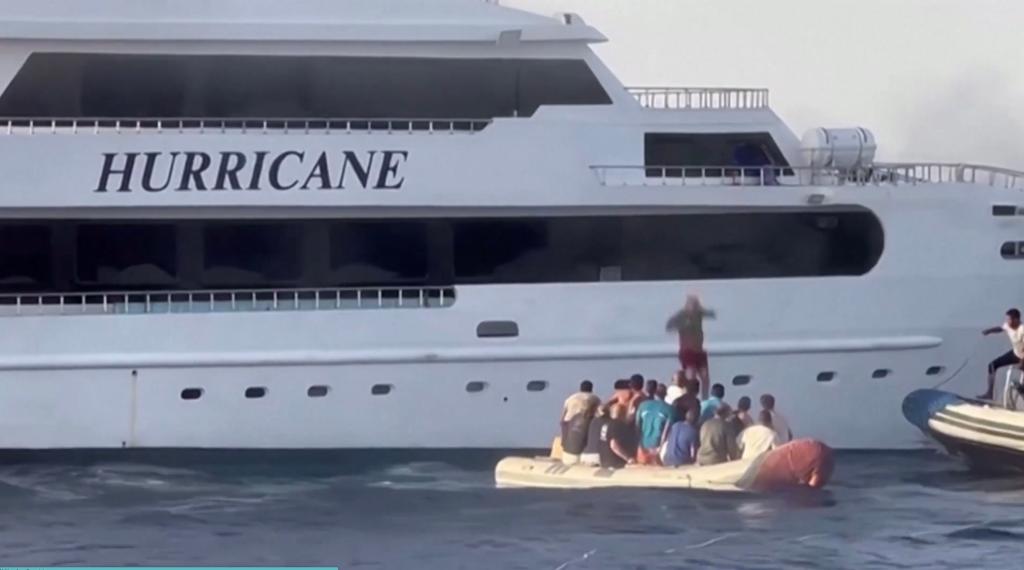 Passenger jumps off yacht.