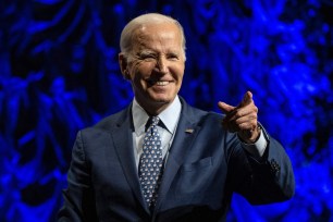 US President Joe Biden points to the crowd after speaking during the League of Conservation Voters Annual Capital Dinner, at The Anthem in Washington, DC, on June 14, 2023.