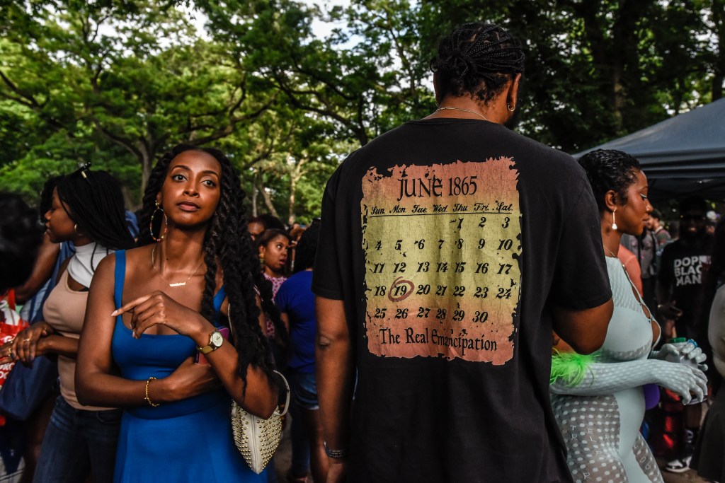 People participate in a Juneteenth celebration in Fort Greene park in Brooklyn on Sunday.
