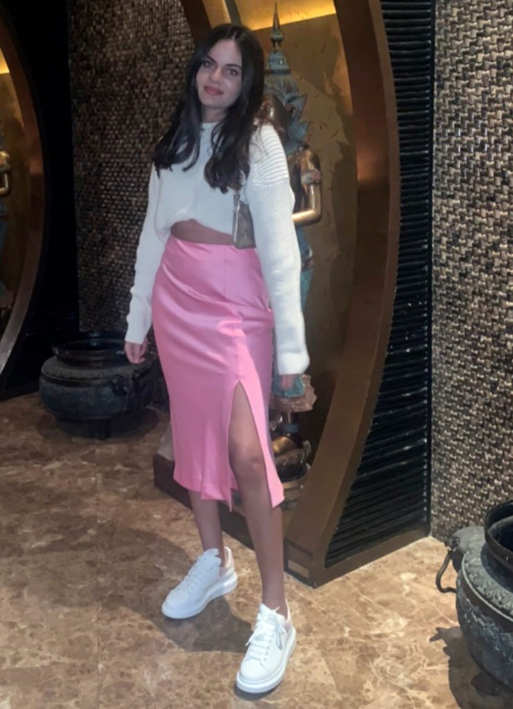 Tia Zakher  in pink skirt and white shirt