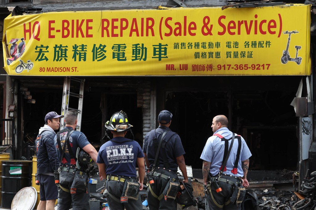 FDNY firefighters at the scene of the deadly fire caused by charging e-bike batteries. 
