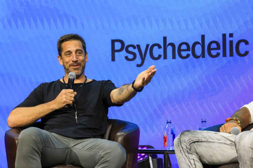 Aaron Rodgers speaks at a psychedelic science convention in Denver on June 21, 2023.