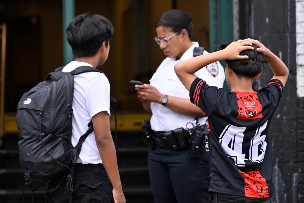 Police talking to friends of the victims.