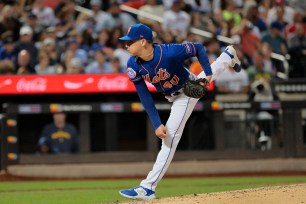 Relief pitcher Drew Smith pitching in the 6th inning.