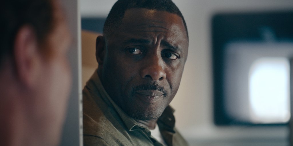 Idris Elba looking worried. 