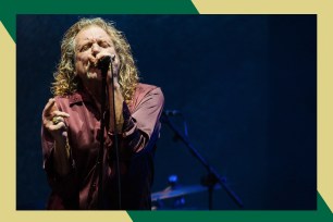 Robert Plant sings his heart out onstage.