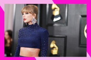 Taylor Swift poses on the red carpet.