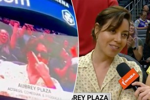 Actress and comedian Aubrey Plaza flipped off the camera while sitting court side at the WNBA game between the L.A. Sparks and Minnesota Lynx on Tuesday. 