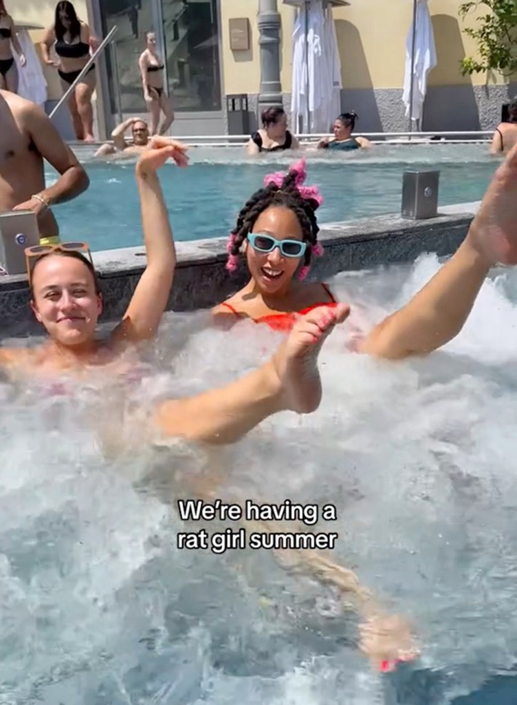 image of 2 women in a hot tub captioned: "We're having a rat girl summer"