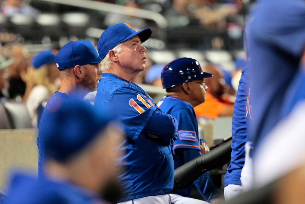 New York Mets manager Buck Showalter #11 in the dugout during the 7th inning.