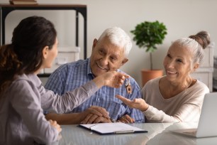 A couple considers whether to get a home equity loan or a HELOC.