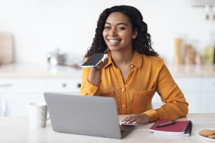 A woman researches how much she should borrow for college.