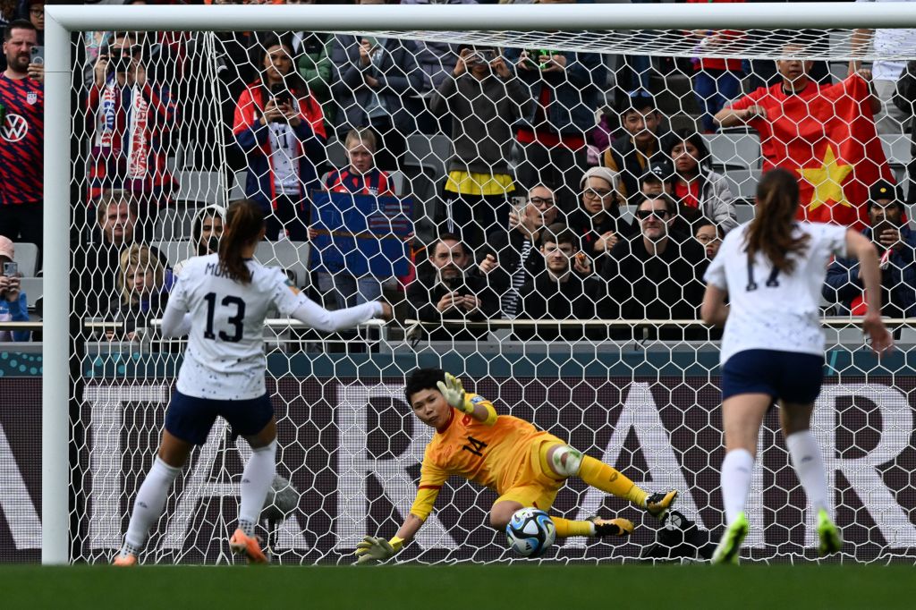 Vietnam's goalkeeper #14 Thi Kim Thanh Tran stops a penalty by USA's forward #13 Alex Morgan during the Australia and New Zealand 2023 Women's World Cup Group E football match between the United States and Vietnam at Eden Park in Auckland on July 22, 2023.