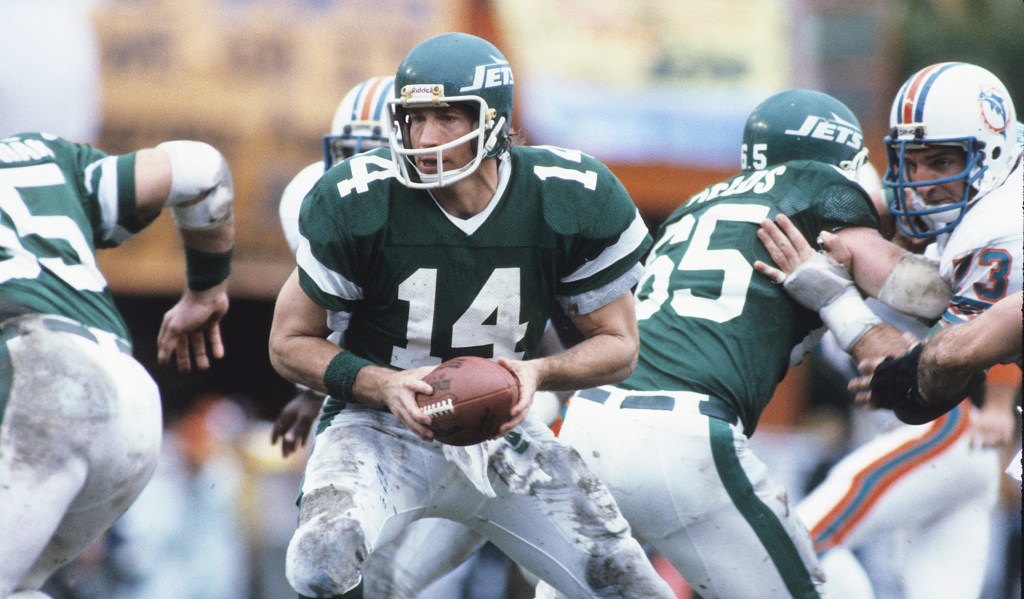Quarterback Richard Todd goes back to pass during the AFC Championship Game against the Miami Dolphins on January 23, 1983.