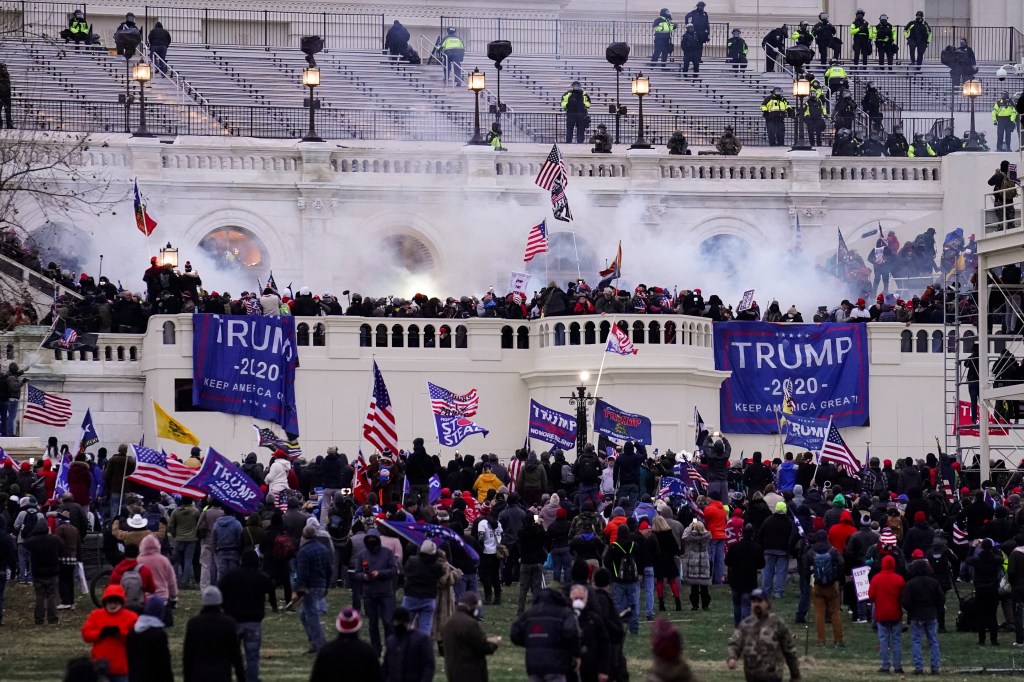 Insurrectionists loyal to President Donald Trump storm the Capitol, Jan. 6, 2021, in Washington.  