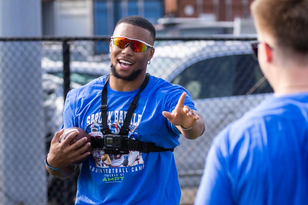 Giantsâ�� Saquon Barkley holds a youth football camp