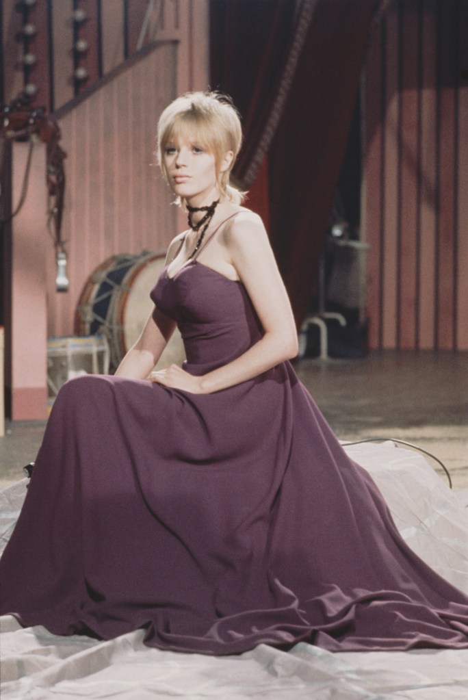 Faithfull poses on the set of the Rolling Stones Rock and Roll Circus at Intertel Studio in London, 1968.