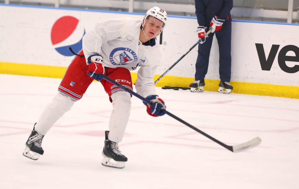 Rangers prospect Adam Sykora works out at development camp.