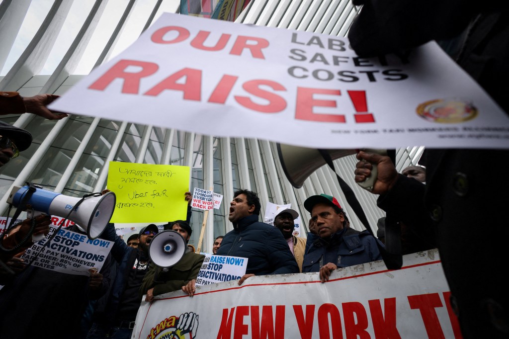 Uber drivers portesting outside of the Uber offices in New York City earlier this year.