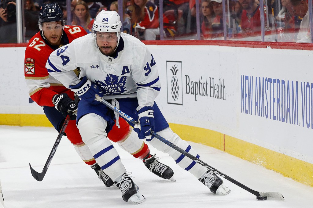 Auston Matthews #34 of the Toronto Maple Leafs skates with the puck against Brandon Montour #62 of the Florida Panthers in Game Four of the Second Round of the 2023 Stanley Cup Playoffs at the FLA Live Arena on May 10, 2023 in Sunrise, Florida.