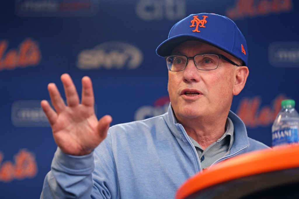 ew York Mets owner Steve Cohen speaking to the media during a press conference before the game.