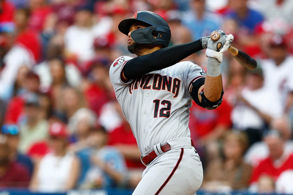 Lourdes Gurriel Jr. #12 of the Arizona Diamondbacks hits a home run during the first inning against the Philadelphia Phillies at Citizens Bank Park on May 22, 2023 in Philadelphia, Pennsylvania. 