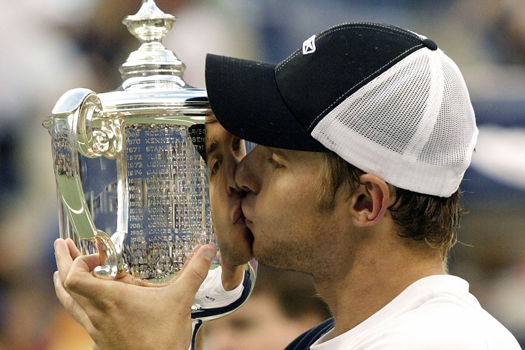 Andy Roddick (USA) kisses the US Open championship trophy during the awards ceremony for the men's finals. Roddick defeated Juan Carlos Ferrero (ESP) 6-3, 7-6, 6-3, for his first grand slam title. 