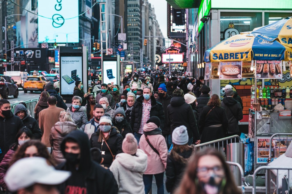 Tourists in Times Square in Manhattan during the outbreak of the Omicron variant of Covid-19.