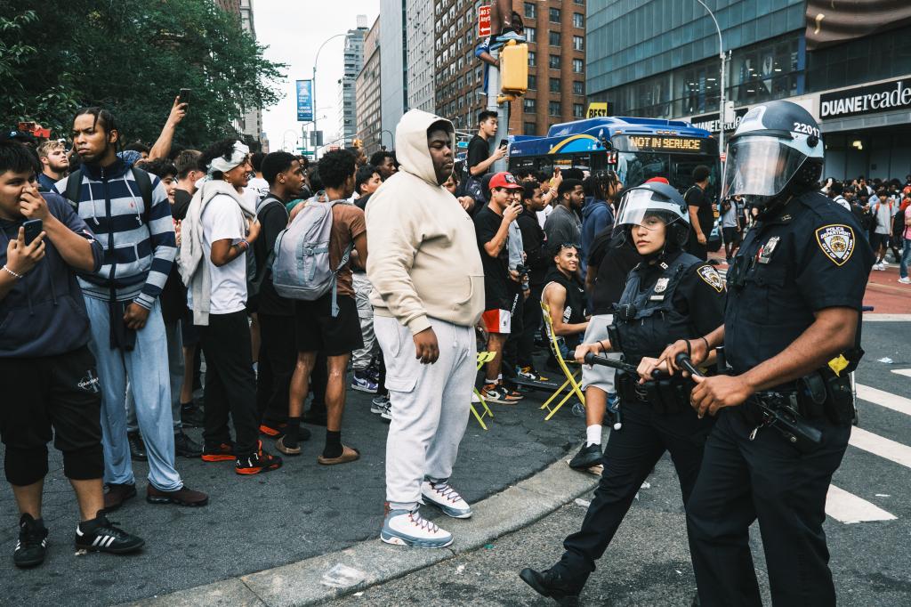 A flash mob in Union Square in Manhattan led by a group of streamers offering free items turns chaotic.