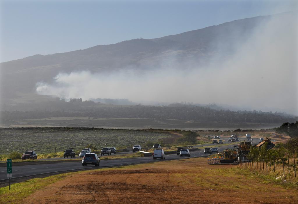 Wildfires in Hawaii forced evacuations, burned multiple structures and caused power outages. 