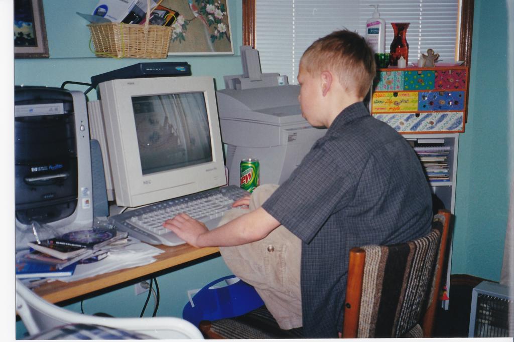 Cam Adair as a child playing video games