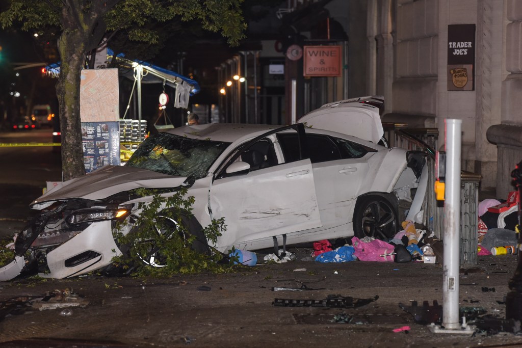 A smashed-up vehicle at the scene of the crash at Court Street and Atlantic Avenue in Cobble Hill.