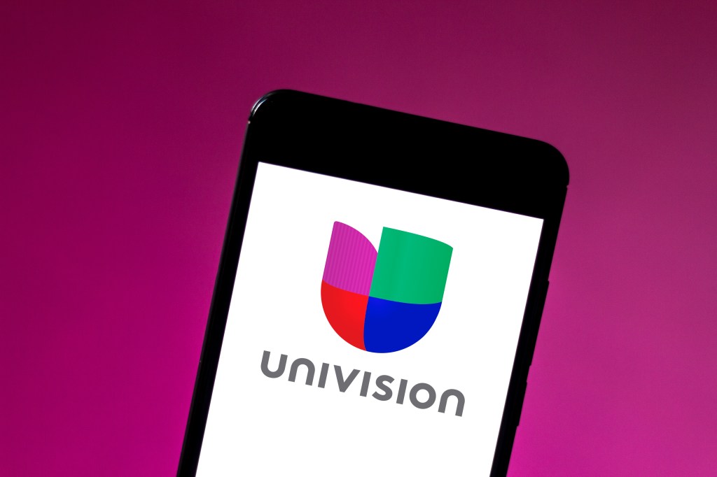 A Univision Chicago executive told employees that two of their colleagues were victims of an armed robbery.