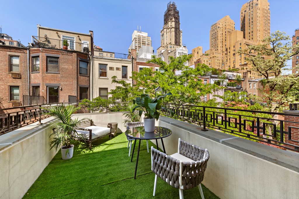 The property additionally includes a lovely terrace space.