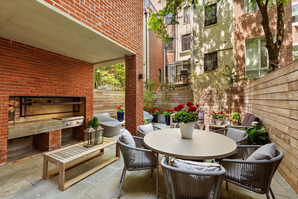 Beyond the perk of an indoor pool, the townhouse has great al-fresco amenities, such as room for outdoor entertaining.