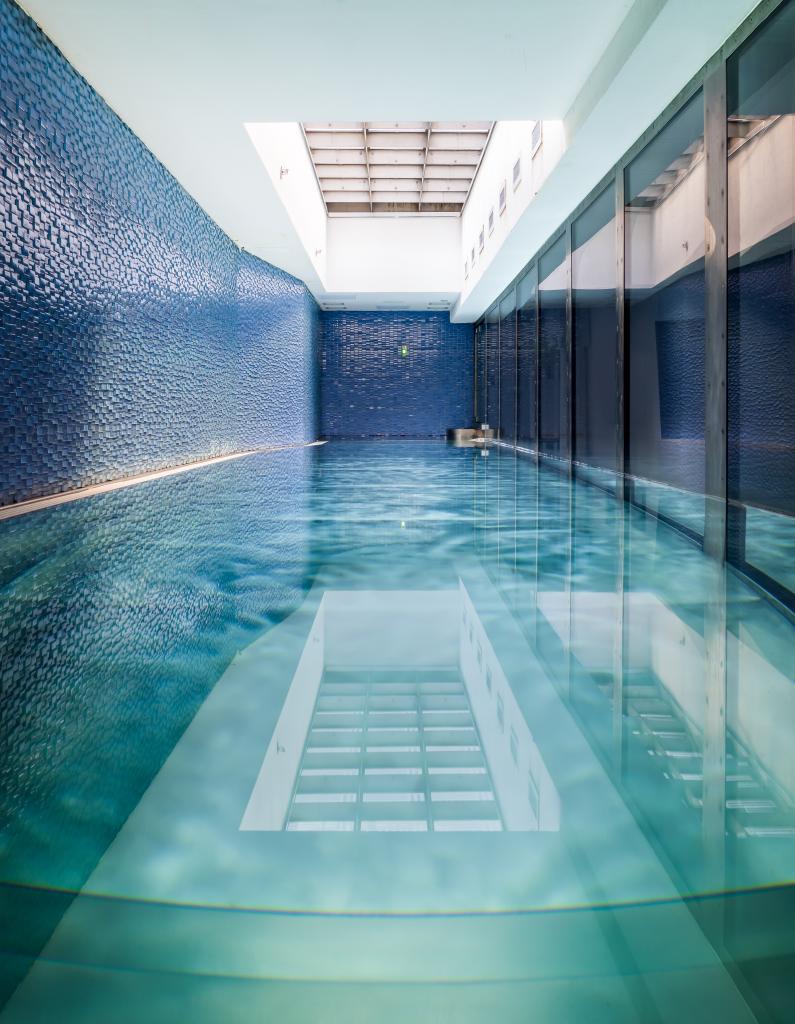 At 109 Waverly Place, the pool comes enclosed in glass.