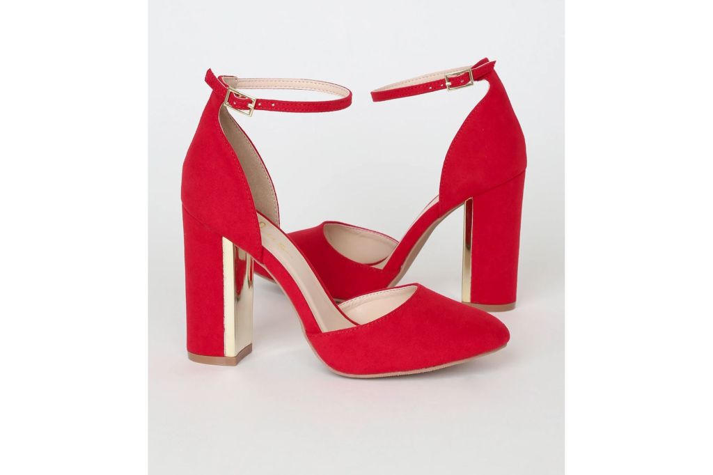 A pair of red heels with gold block heels.