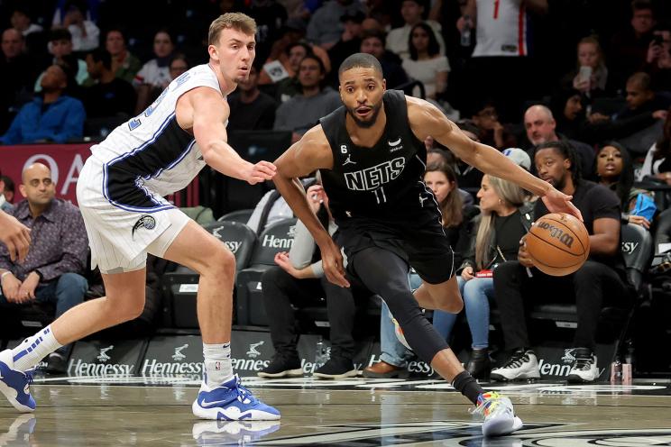 Brooklyn Nets forward Mikal Bridges (1) drives to the basket against Orlando Magic forward Franz Wagner (22) during the third quarter at Barclays Center. 