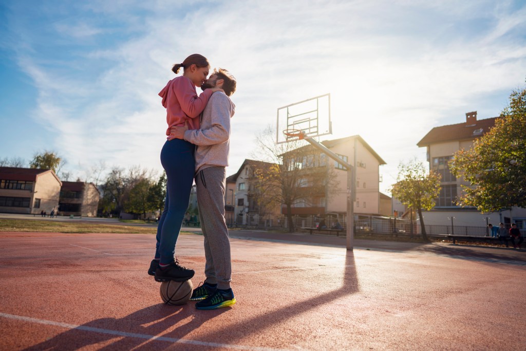 Heterosexual women are generally attracted to tall men due to evolutionary, biological, and social reasons, according to Avigail Lev, who specializes in cognitive behavioral therapy.