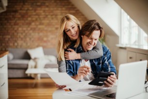 A couple is happy about how much is in their savings.