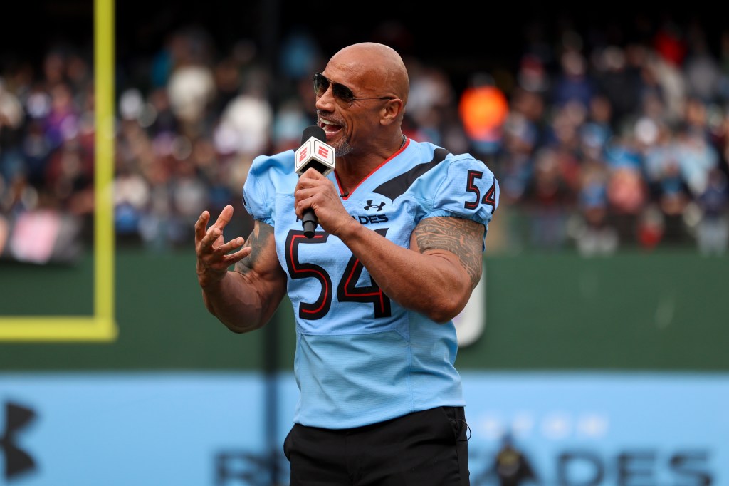 Dwayne The Rock Johnson hypes up the crowd before the game between the Arlington Renegades and the Vegas Vipers 